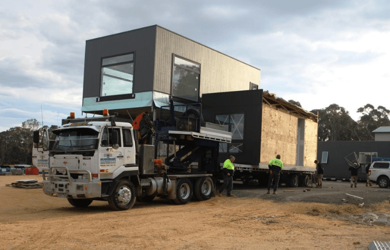 Modular home being transported